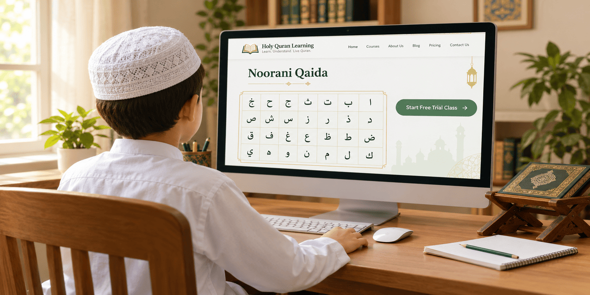 Young boy in white shalwar kameez and cap learning Noorani Qaida online on Holy Quran Learning