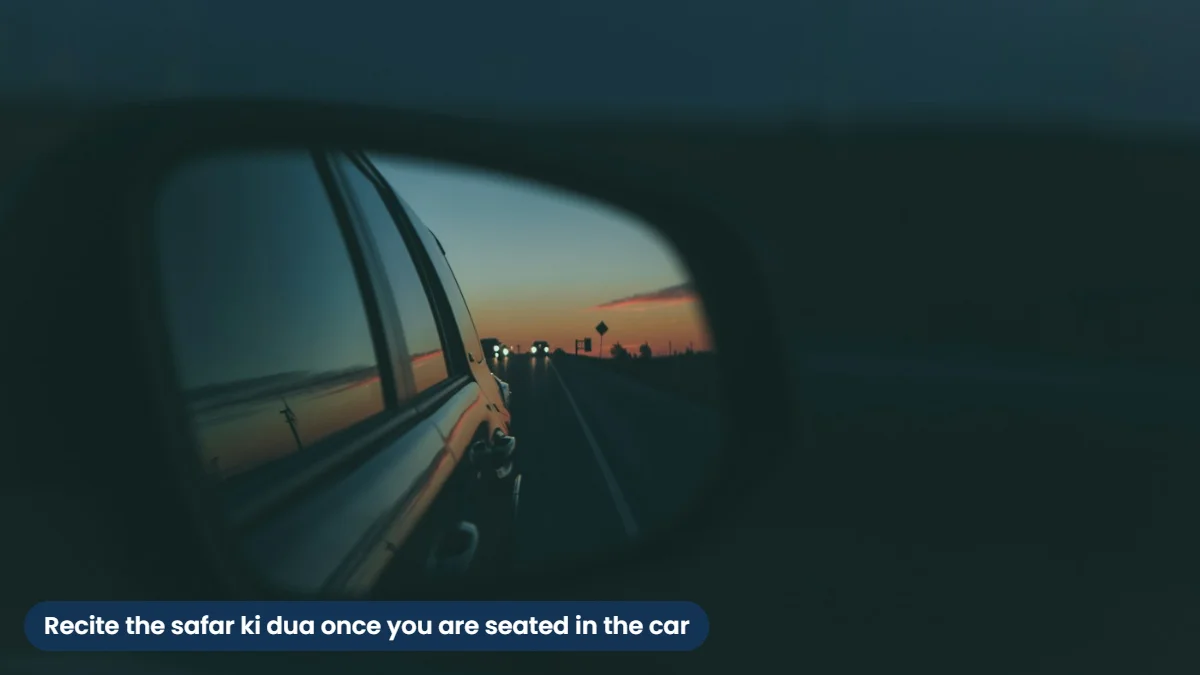 Car side mirror on an open road at sunset, the moment to recite the dua for travelling by car