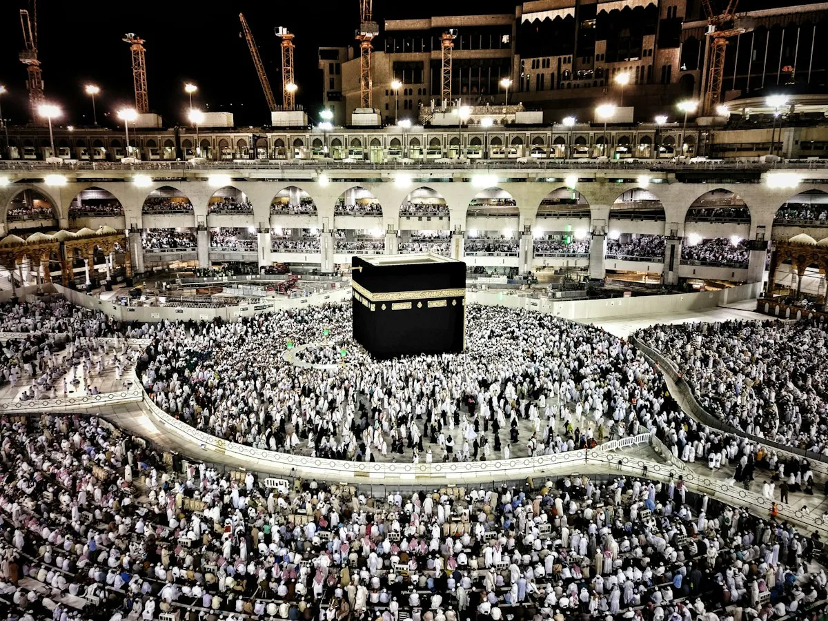 Large Ramadan Umrah crowds performing Tawaf around the Kaaba in Masjid al-Haram, Makkah