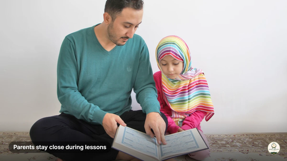 Safe online Quran classes in the UK: a father sitting with his daughter as she reads the Quran